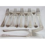 A set of six Old English Pattern silver table forks and six matching dessert forks,