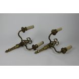 A pair of Louis XVI style gilt brass twin branch wall lights,