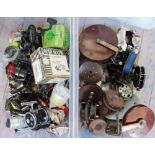 A collection of fishing reels and accessories,