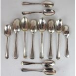 Six George V silver rat tail pattern table spoons, 1913; six silver rat tail pattern dessert spoons,