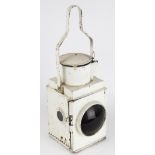 A British Rail white signal lamp 'stop', with with convex red lens and burner,