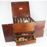 An early 19th century mahogany Apothecary cabinet,