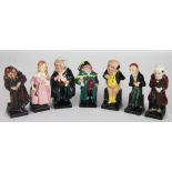 Seven Royal Doulton Dickens Characters.