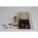 A collection of jewellery to include; a pair of earrings with a fitted case,