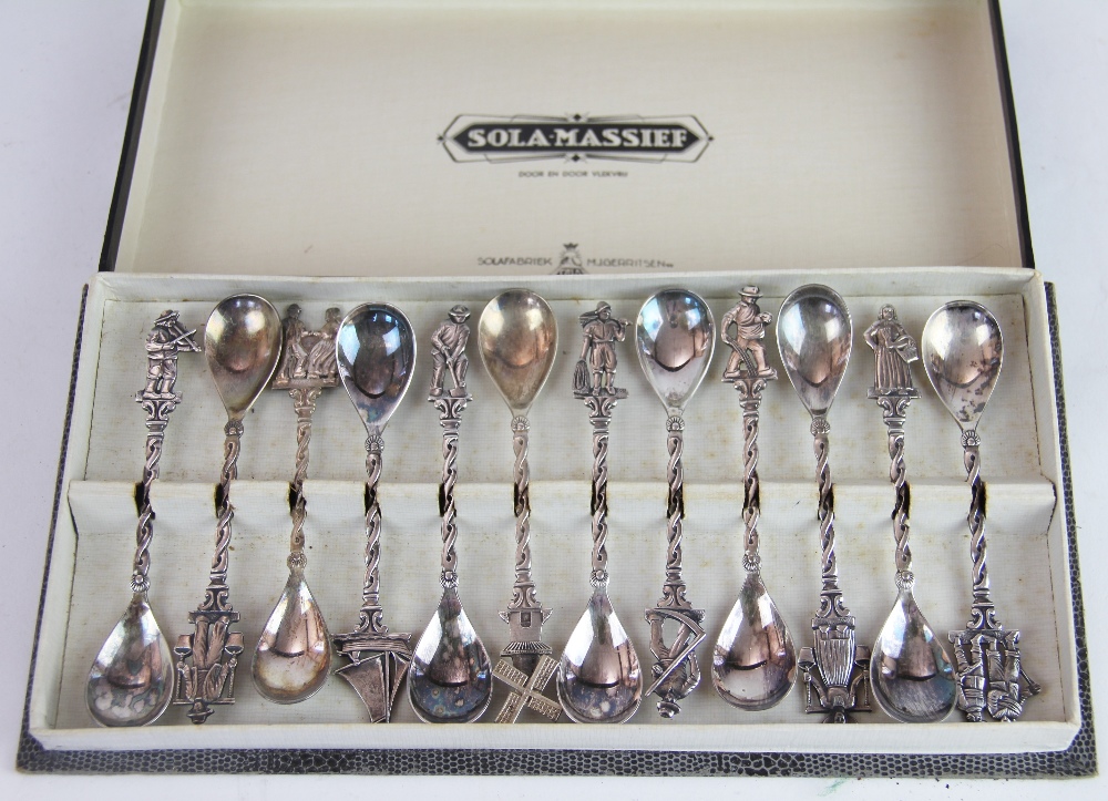 A set of twelve Dutch white metal spoons,