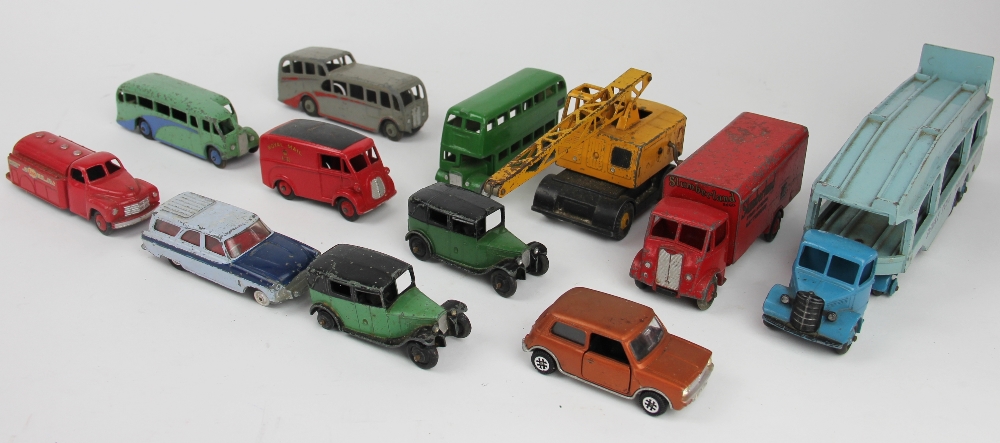 A Dinky Supertoys 528 Pullmore car transporter; a Dinky Guy 'Slumberland' van;