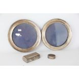 A pair of circular silver photograph frames, Joseph Gloucester Ltd, Birmingham,