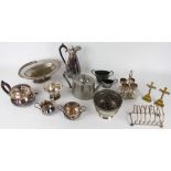 An Edwardian silver plated three piece bachelors tea set; an egg cruet;