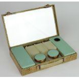 A Sirram 1960's vanity case, the shagreen effect case enclosing a fitted interior with mirrored lid,