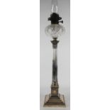 A Victorian silver plated fluted Corinthian column oil lamp, cut glass reservoir (cracked),
