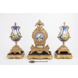 A mid 19th century French gilt metal clock garniture,