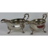 A pair of George III silver sauce boats, William Grundy London 1770 each of low, oval form,