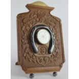 A Queen Victoria 1897 Jubilee carved oak easel time piece,