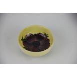 A Moorcroft anemone pattern small bowl, yellow ground, marks to base,