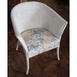 A Lloyd Loom tub chair;