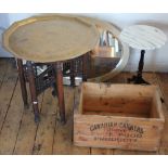 A marble top wine table, with an oval wall mirror,