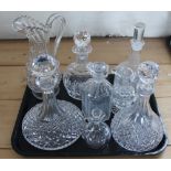 Three trays containing a collection of glass ware, to include; ships decanters and stoppers, jugs,