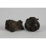 A Japanese carved hardwood netsuke, worked as two rats with a peach, 3.