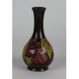 A Moorcroft Hibiscus pattern bottle vase, c.