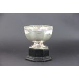 A silver octagonal pedestal bowl, Joseph Rogers & Sons, Sheffield 1910, of plain polished form,