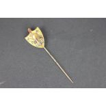 A 19th century yellow metal stick pin,