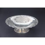 A George V silver pedestal dish, with pierced rim and fish scale detailing, Mappin and Webb,