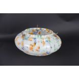 An Art Deco ceiling light bowl, with mottled orange, blue, white and green details,