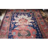 A Caucasian hand woven wool carpet,