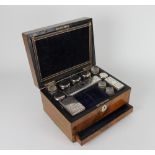 A Victorian walnut work box, the lid inset with a mother of pearl panel named for J. H.