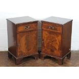 Three reproduction mahogany bedside cupboards, each with a drawer and cupboard door on bracket feet,