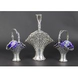 A garniture of three Edwardian silver baskets, Henry Matthews, Birmingham 1910,