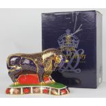 A Royal Crown Derby Bull paperweight LVIII, the cobalt bull raised on kidney shaped base,