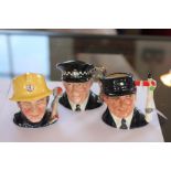 Three Royal Doulton character jugs; The Engine Driver D6823, 9.