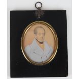 English School - 19th Century,
pencil and gouache miniature,
portrait of a gentleman in a blue coat,