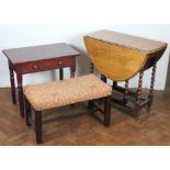 A light oak gateleg table, on barley twist legs,