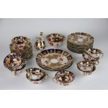 A twelve piece Royal Crown Derby style imari tea service, comprising; milk jug, sugar bowl,