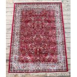 A Kashmir tree of life rug, with a red ground,