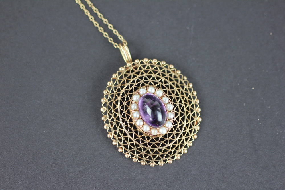 A Zeeta amethyst and split pearl set gold pendant, South African, mid 20th century,