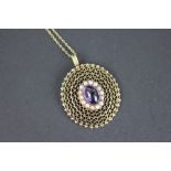 A Zeeta amethyst and split pearl set gold pendant, South African, mid 20th century,