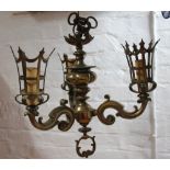 A Victorian style brass three branch pendulum light fitting, in Gothic style,