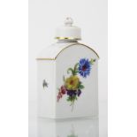 A Furstenberg West - Germany porcelain tea caddy and cover, decorated with flowers,