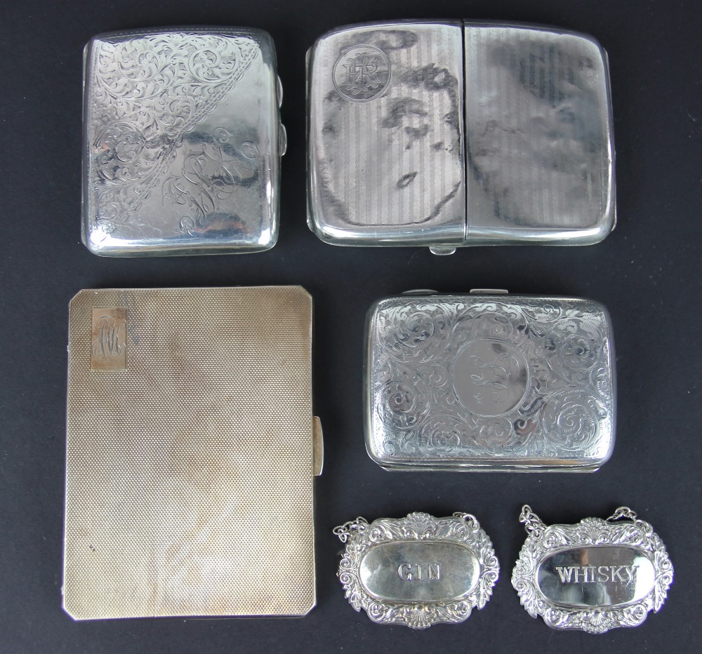 Four silver cigarette cases, to include: a silver gilt example Clark and Sewell, Chester 1945,