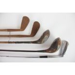 A J P Cochrane hickory shafted 'Mashie' golf club; another hickory iron;