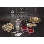 A late Victorian silver plated centre piece, with two cranberry glass bowls,