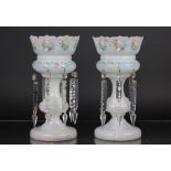 A pair of Victorian opaque glass lustres, with polychrome detailing and cut glass lustre drops,