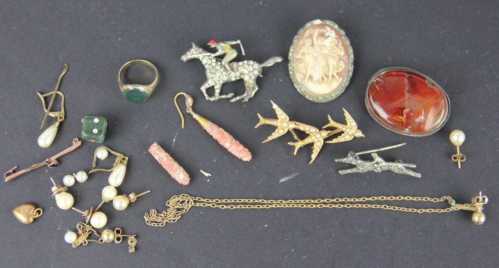 A collection of jewellery to include; paste set jockey brooches,