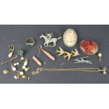 A collection of jewellery to include; paste set jockey brooches,