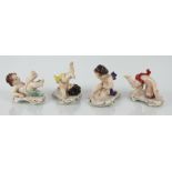 A set of four Volkstedt figures of tumbling children,