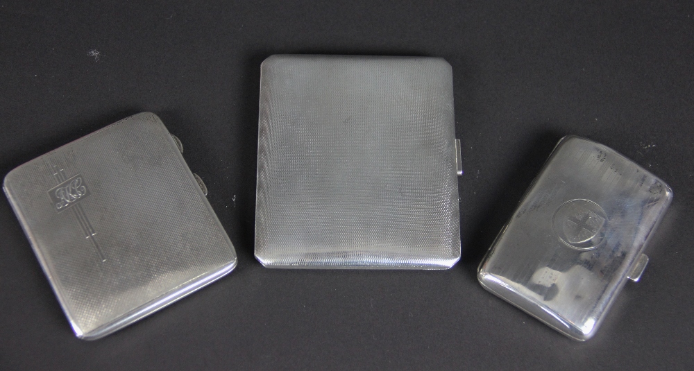 Three silver cigarette cases,