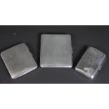 Three silver cigarette cases,